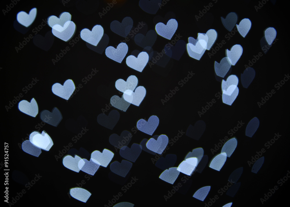 Festive background of lights in hearts shape Festive background of lights in hearts shape