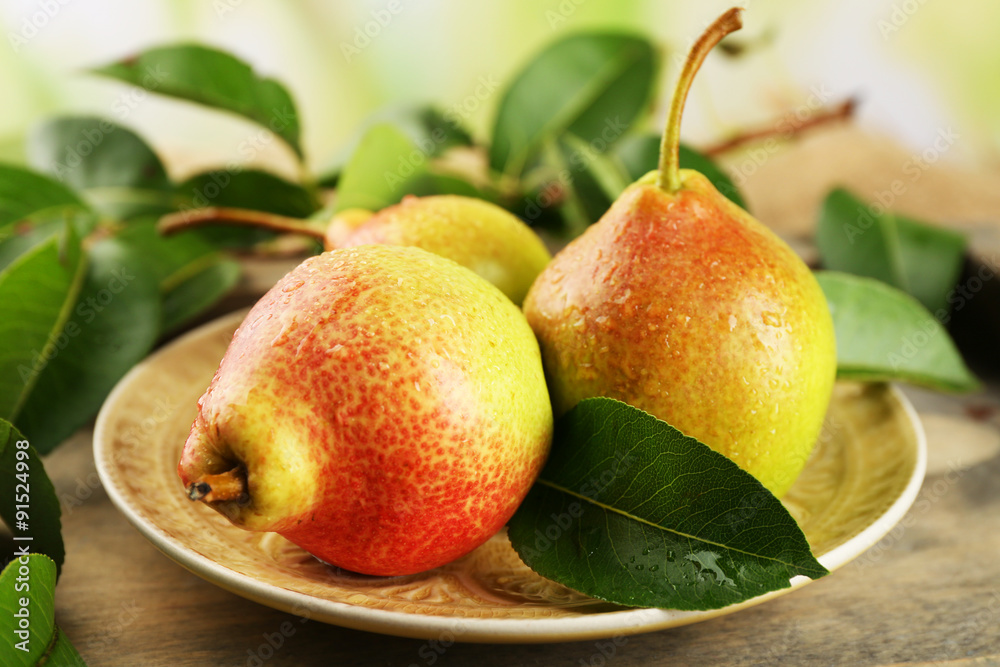 Fresh pears on wooden table, closeup Fresh pears on wooden table, closeup