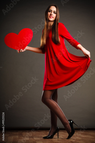 Valentines Day woman holding heart.