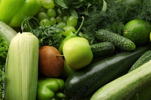 Green fruits and vegetables background