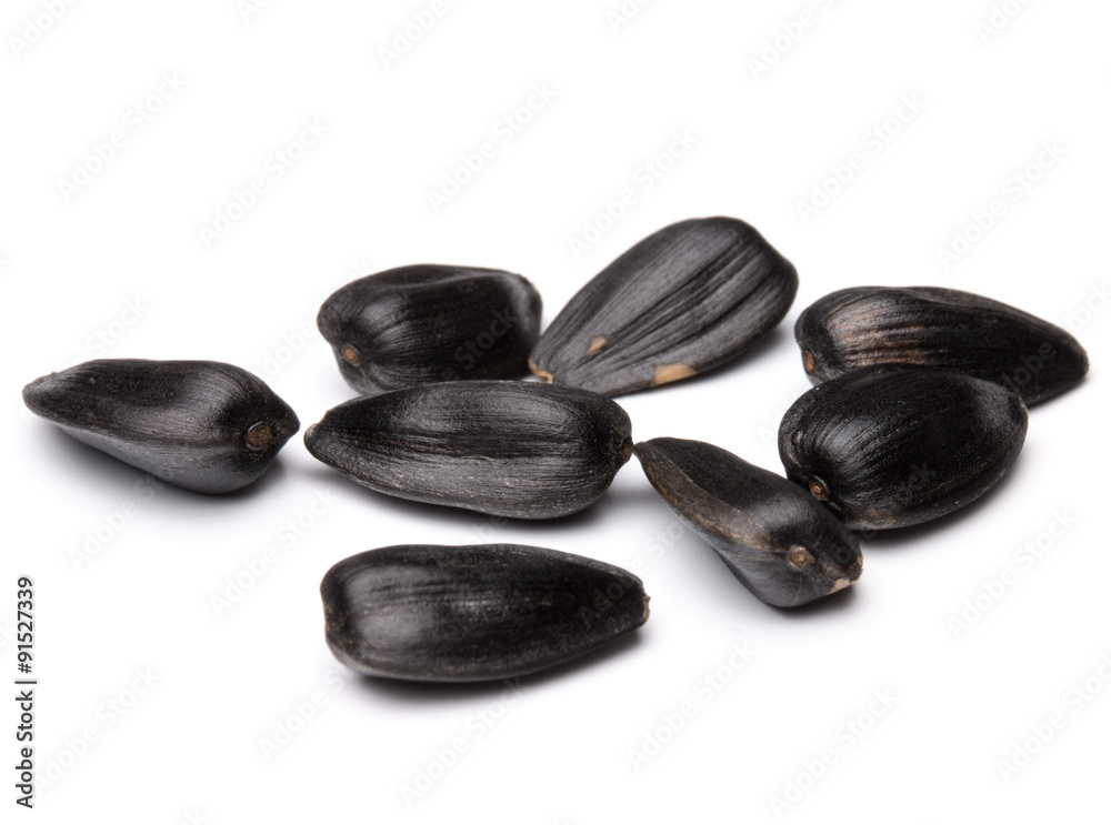 Sunflower seeds isolated on white background close up Sunflower seeds isolated on white background close up