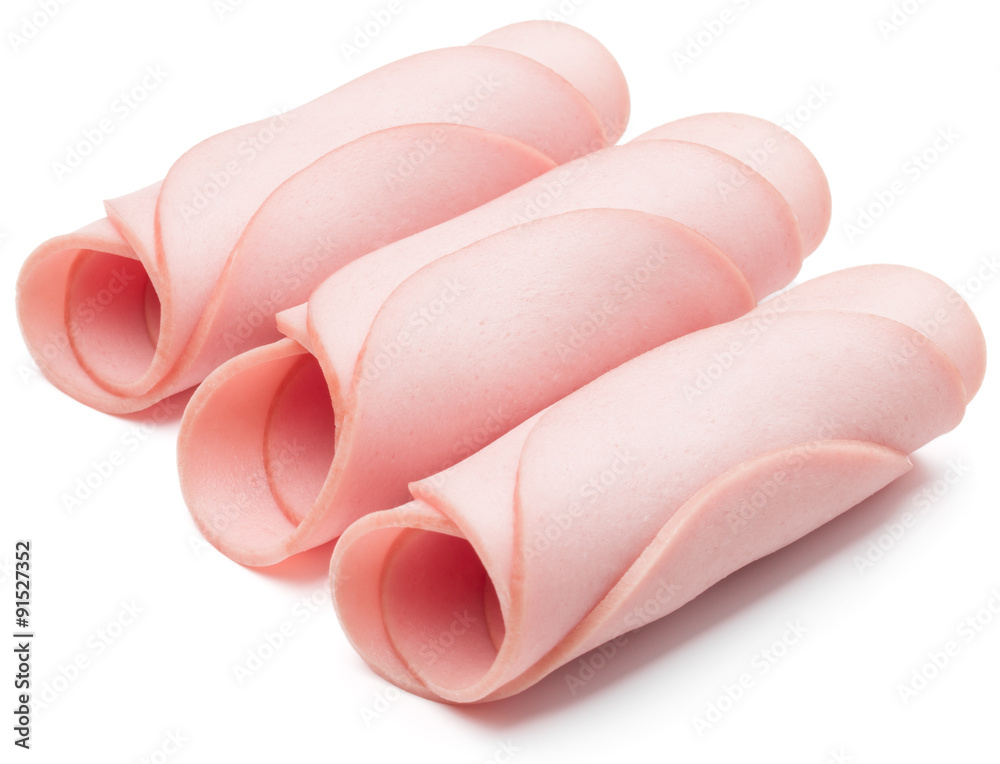 cooked boiled ham sausage or rolled bologna slices isolated on w cooked boiled ham sausage or rolled bologna slices isolated on w