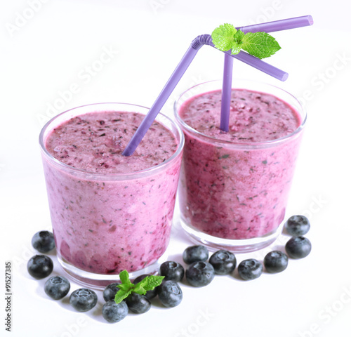 Glasses of blueberry smoothie, closeup