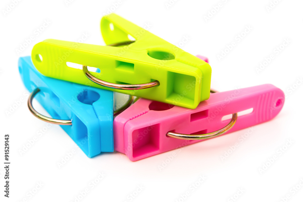 colorful clothespins on a white background