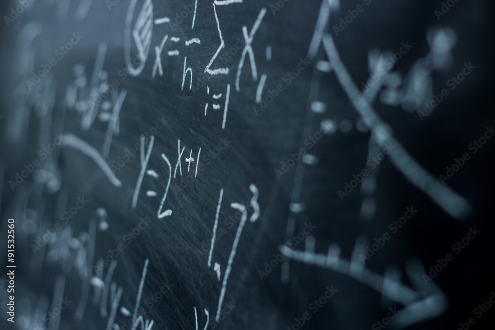 Maths formulas on chalkboard background Maths formulas on chalkboard background