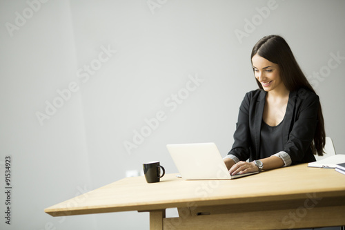 Young woman working in the office