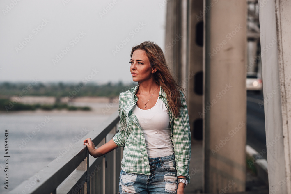 portrait of woman on bridge
