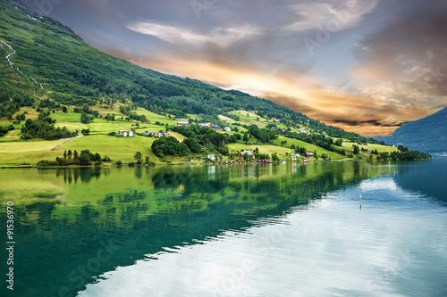 rural landscape, Norway, Olden, green hills seaside. fjords