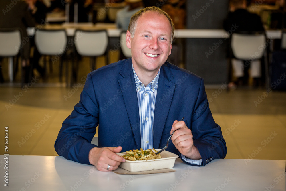 Businessman eating lunch