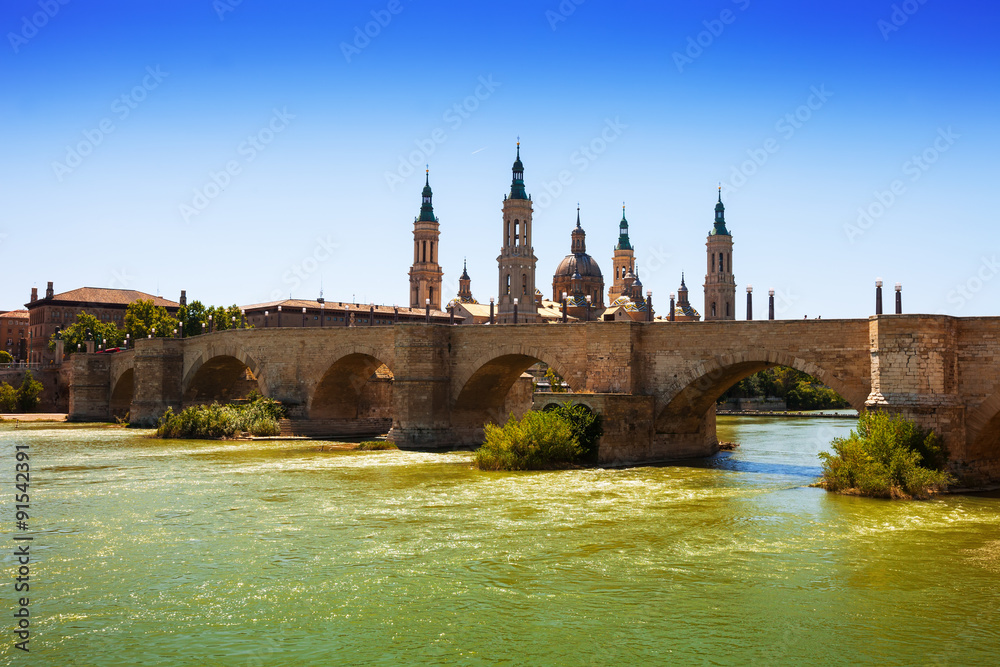ancient stone bridge over Ebro river in Zaragoza