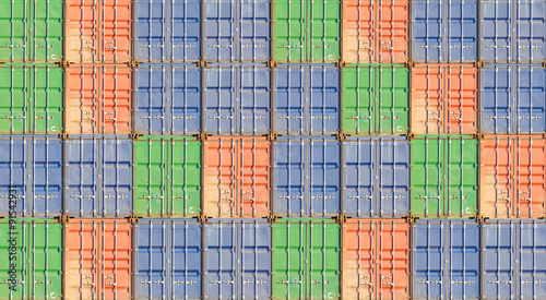 Colorful stack of container shipping at dockyard 