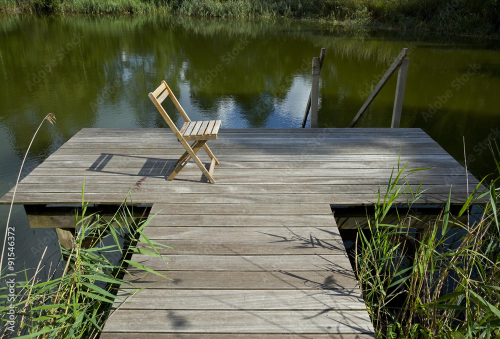 Gartenteich mit Steg StockFoto Adobe Stock