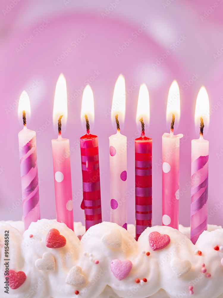 Pink birthday candles StockFoto Adobe Stock