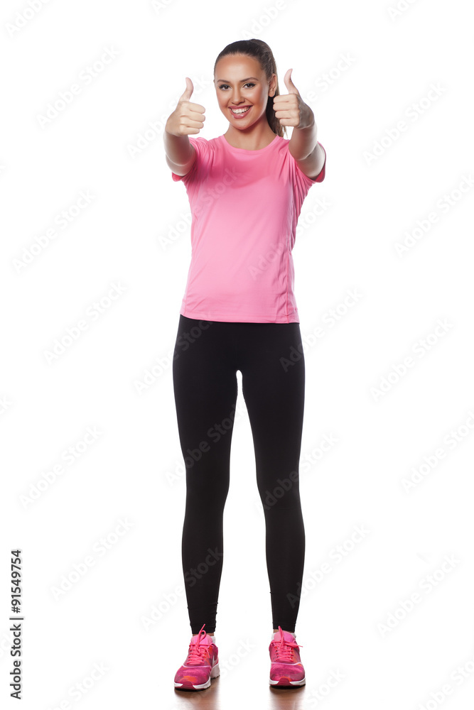 Side view of a beautiful young athlete on a white background Side view of a beautiful young athlete on a white background