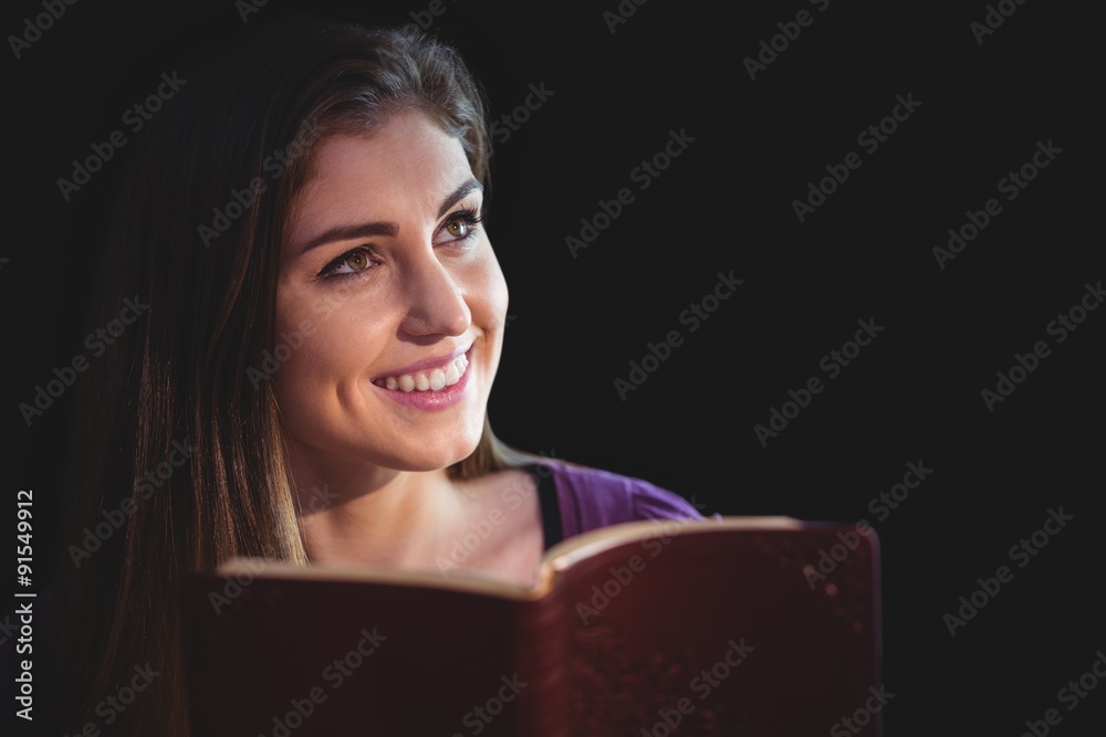 Woman praying with her bible Woman praying with her bible