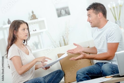 Couple discussing bills