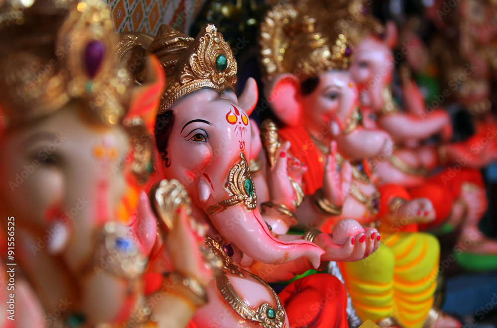 Beautiful idols of Lord Ganesha for sale in a Shop