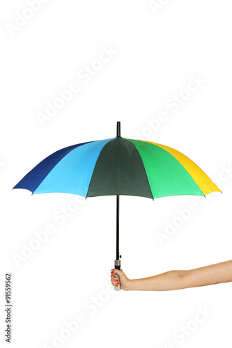 Colorful opened umbrella in hand