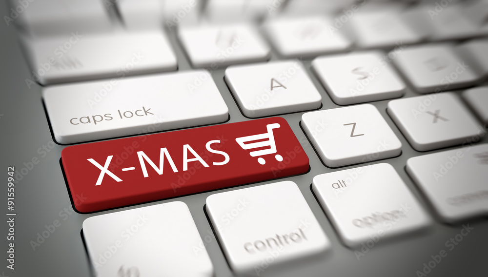 X-mas Key on Laptop for Christmas Shopping Concept X-mas Key on Laptop for Christmas Shopping Concept