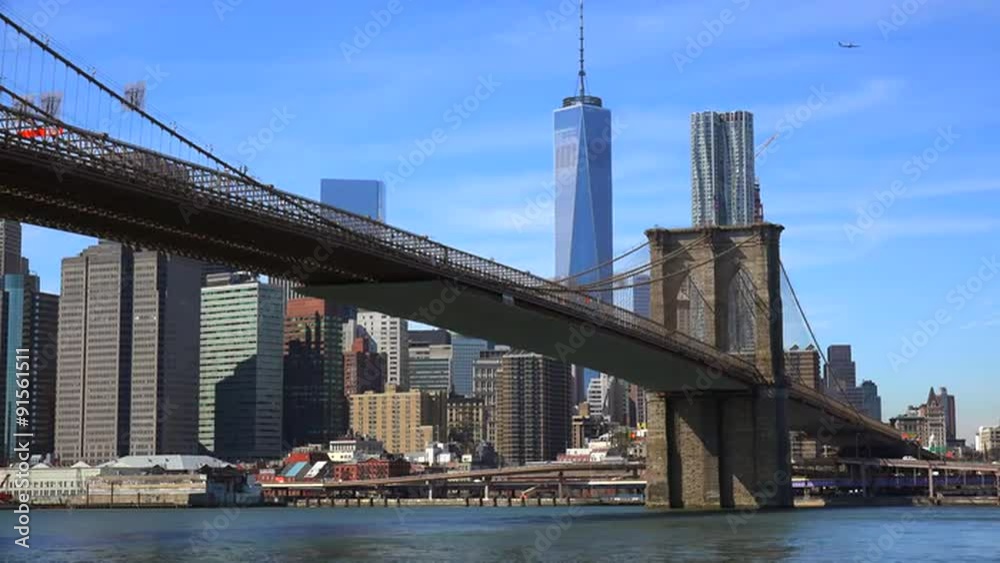 Establishing shot of New York City with Brooklyn Bridge, Freedom Tower, and East River. Establishing shot of New York City with Brooklyn Bridge, Freedom Tower, and East River.