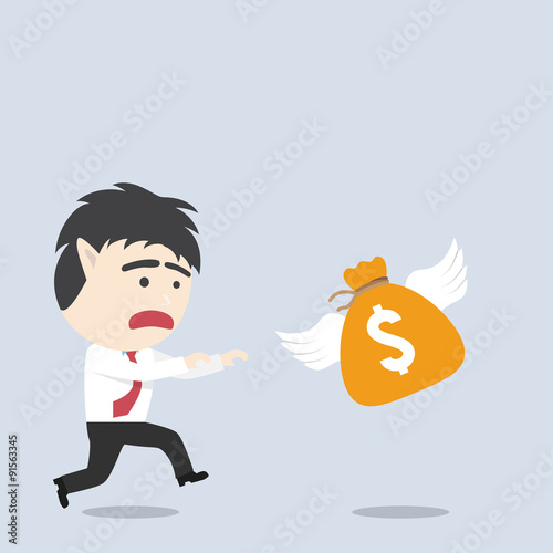 Businessman catch a money bag