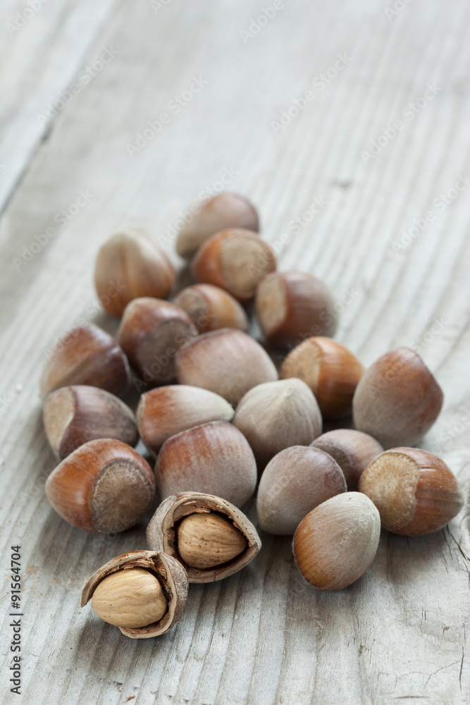 hazelnuts on wooden background hazelnuts on wooden background