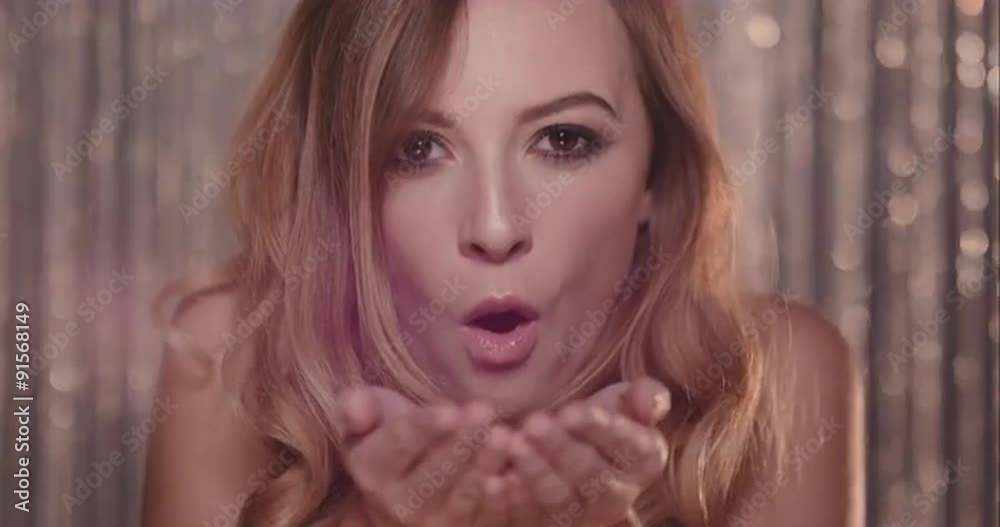 Sexy woman blowing gold glitter slow motion - Red Epic Dragon