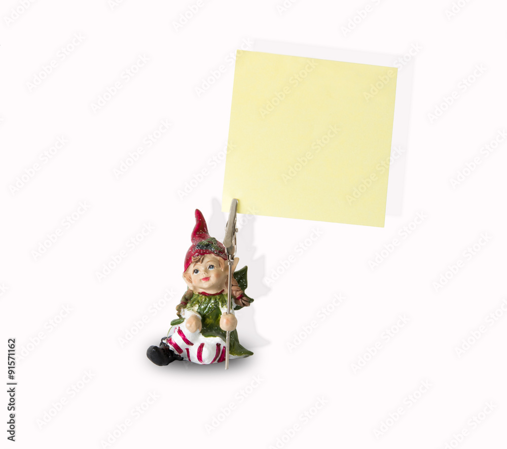 Naklejka premium Statuetta di un folletto con pinza porta biglietti