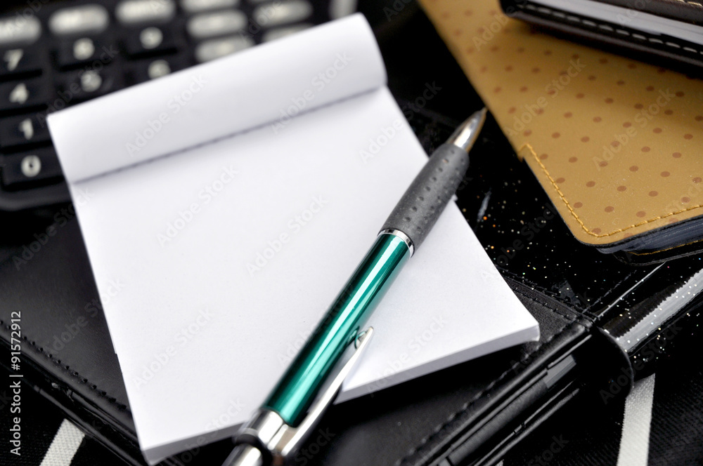 close up pen on notepad close up pen on notepad