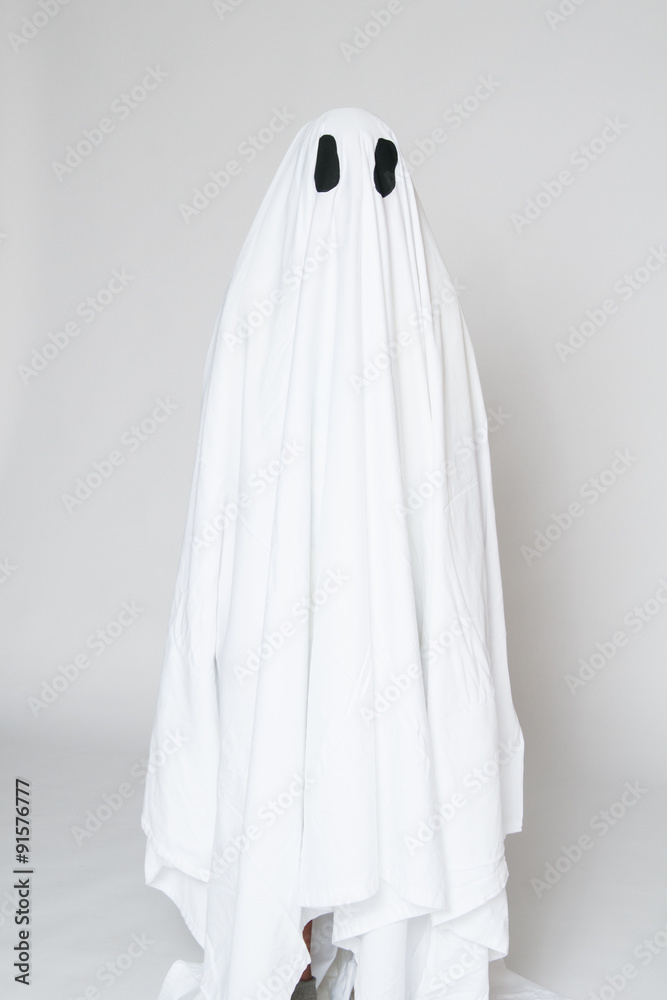 young boy in a homemade ghost costume ready for halloween young boy in a homemade ghost costume ready for halloween