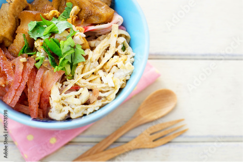 Chinese rice noodle roll with egg, chinese sausage, tofu (Kuay T photo