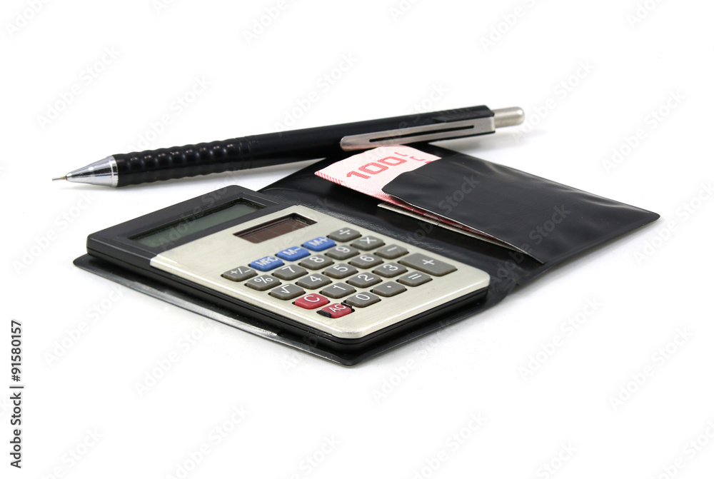 A calculator, a pen and Thai cash on isolated background. A calculator, a pen and Thai cash on isolated background.