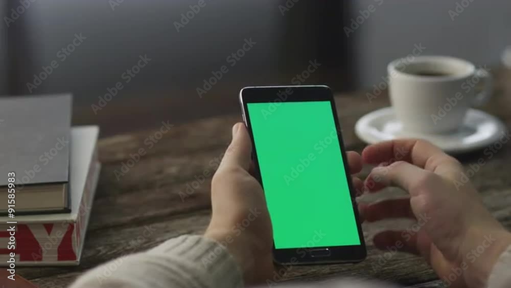 Using Android Phone in Portrait Mode at Home. Casual Lifestyle Using Android Phone in Portrait Mode at Home. Casual Lifestyle