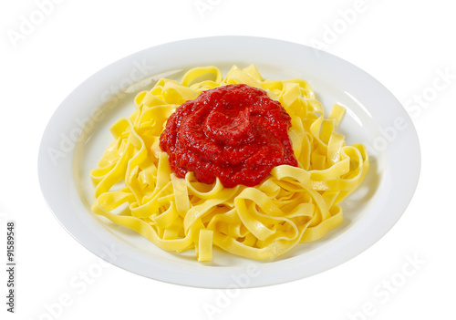 Tagliatelle pasta with tomato paste