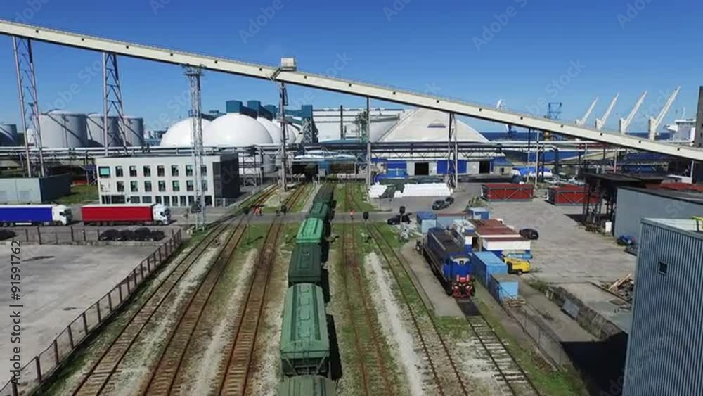Aerial Drone Shot of Railway Station with Moving Freight Train Aerial Drone Shot of Railway Station with Moving Freight Train