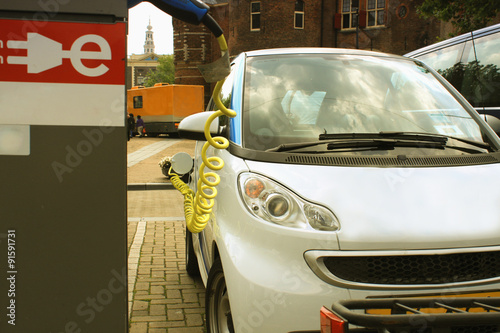 Fototapeta Naklejka Na Ścianę i Meble -  hybrid vehicle on charging