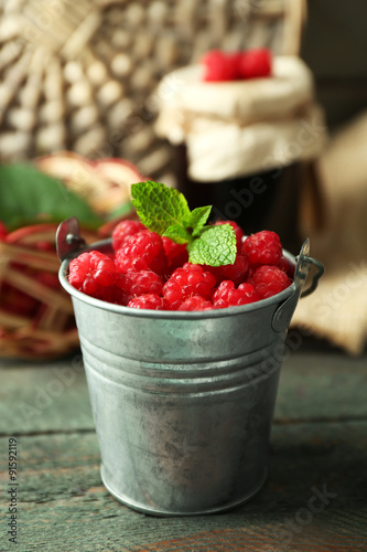 Sweet raspberries on wooden  background