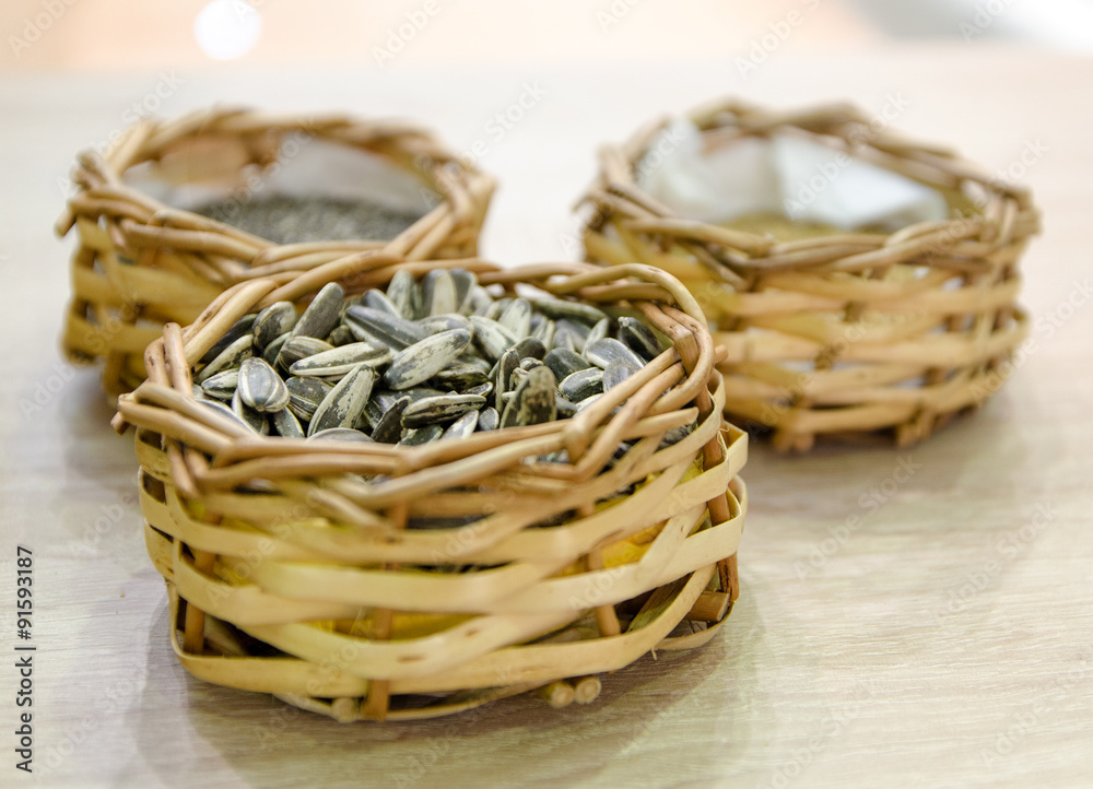 sunflower seeds in a small basket