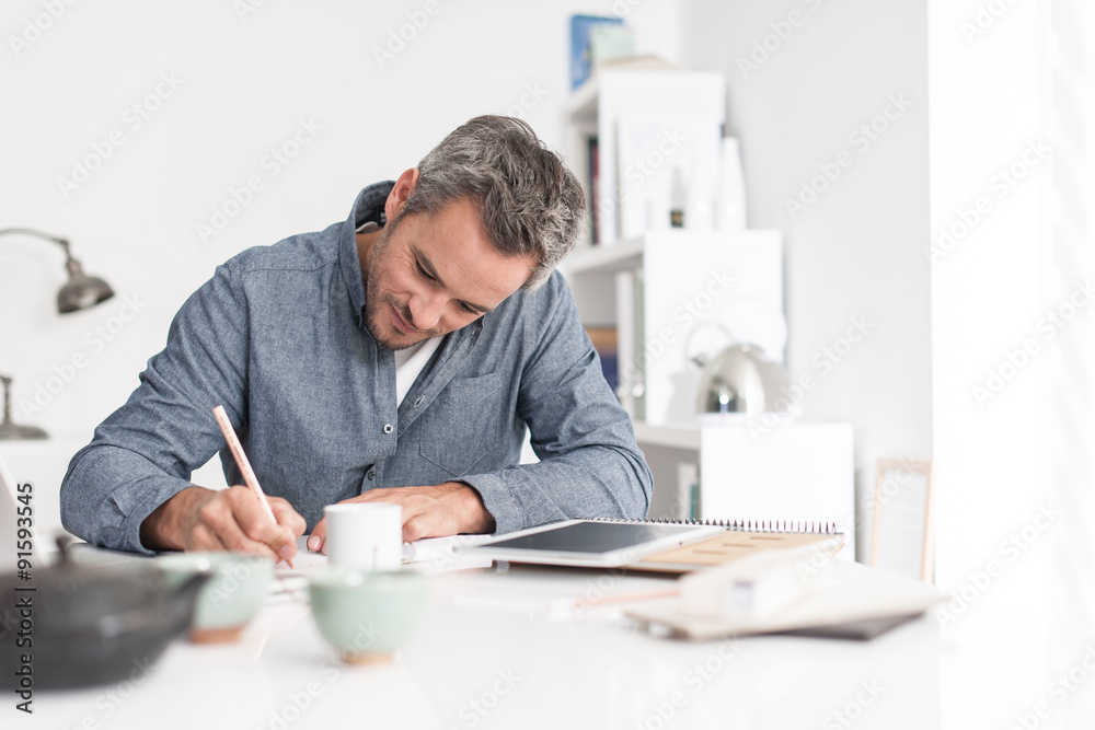Portrait of a nice smiling grey hair man with beard, working at Portrait of a nice smiling grey hair man with beard, working at