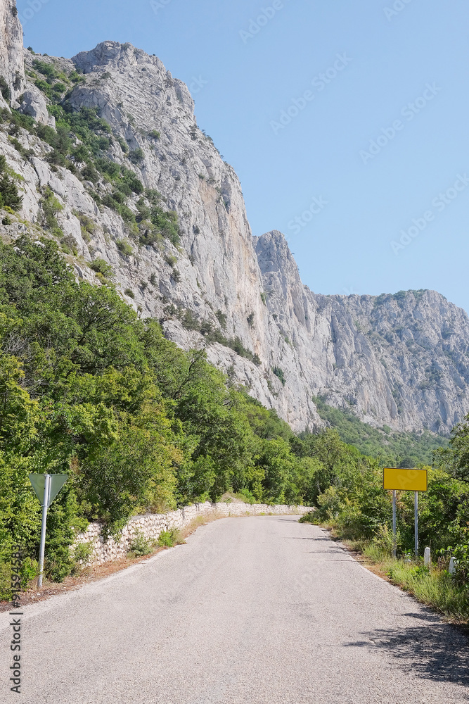 Landscape with the image of a mountain road