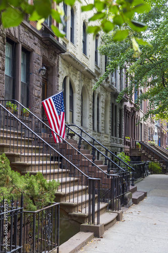 Brownstone houses in urban residential neighborhood of Brooklyn, NYC