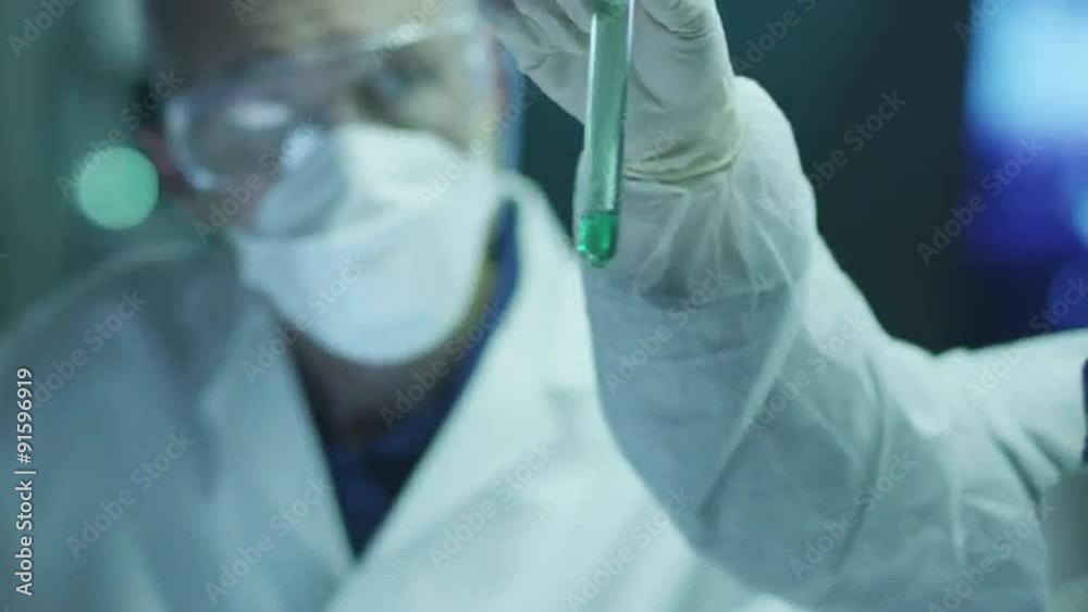 Team of Scientists are Doing Biological Researches and Writing Data into Tablet.