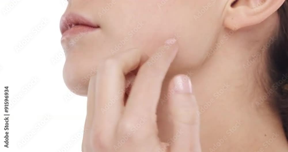 Beauty portrait of woman touching beautiful face in slow motion skincare concept on a white background Beauty portrait of woman touching beautiful face in slow motion skincare concept on a white background