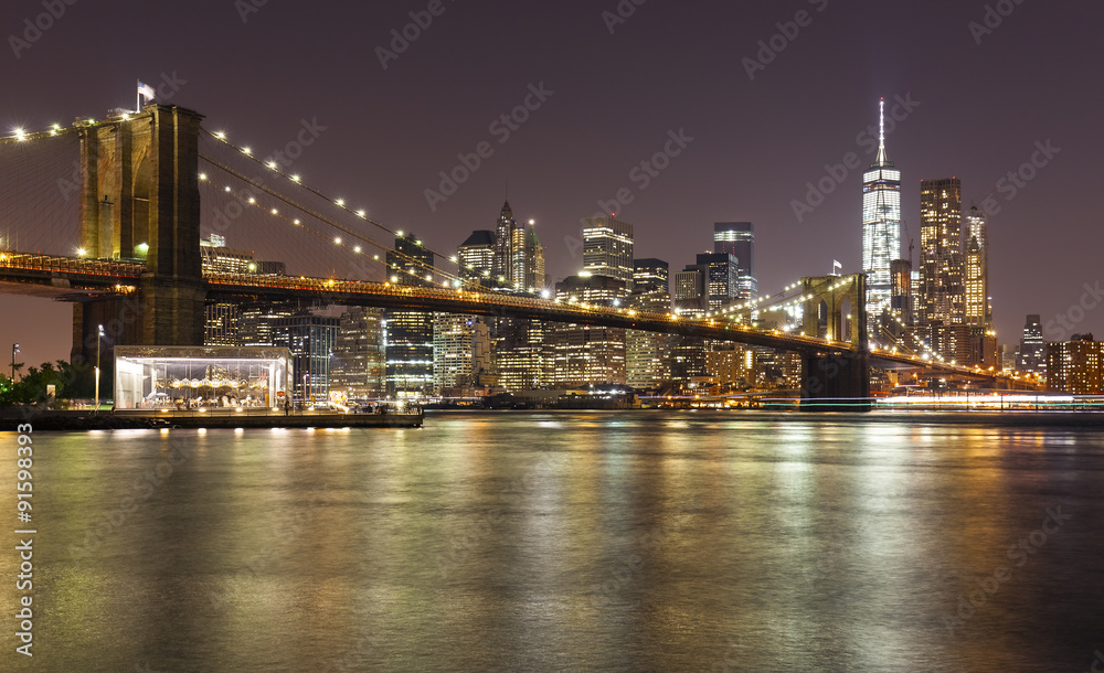 Brooklyn bridge and Manhattan at night, New York City, USA.