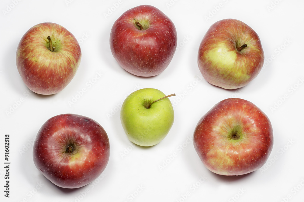 Red and green apples on white Red and green apples on white