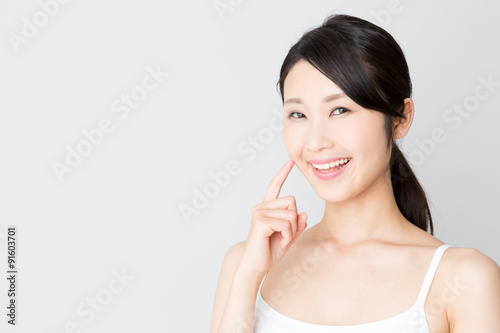 attractive asian woman skincare image