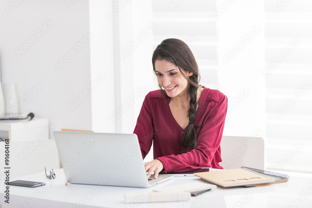 Portrait of a dark hair woman, home working in casual clothes. S Portrait of a dark hair woman, home working in casual clothes. S