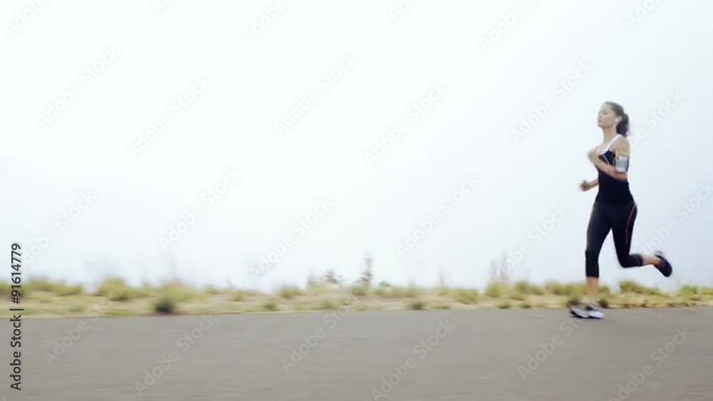 woman running on road close up shoes steadicam shot woman running on road close up shoes steadicam shot