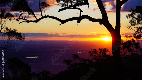 Fototapeta Orange Sunset With Silhouettes 