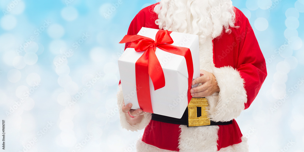 close up of santa claus with gift box close up of santa claus with gift box